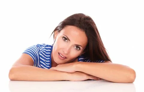 Attractive lady looking at camera with head and shoulders in horizontal view  Stock Photos