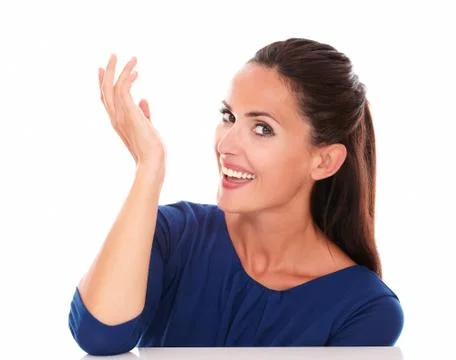 Attractive lady looking at you while smiling in white background Stock Photos
