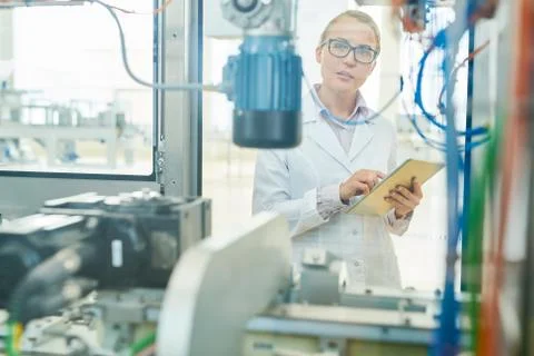 Attractive Machine Operator at Work Stock Photos
