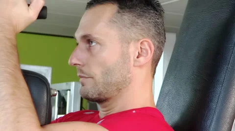 Attractive man at chest exercises Video stock 30466770