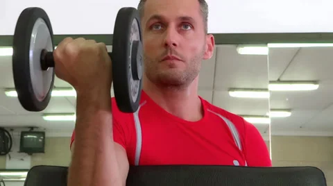 Attractive man doing workout Stockbeeldmateriaal 30467625