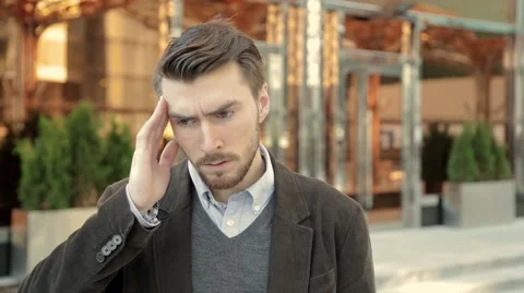 Attractive man has a headache Vidéo 68399850