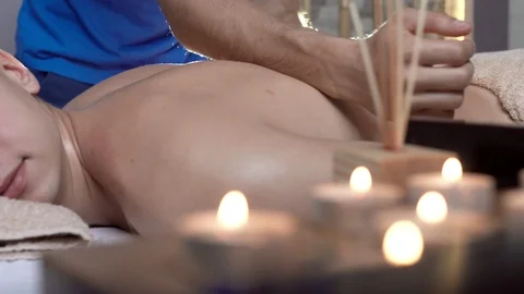 Attractive Man Having a Great Back Massage Body Treatment in Beauty Spa Center Video stock 97658331