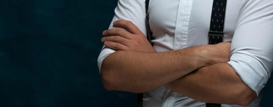 Attractive man posing on dark background Stock Photos