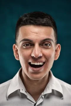 Attractive man posing on dark background Stock Photos
