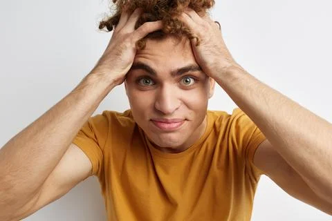 Attractive man posing studio smile Lifestyle unaltered Stock Photos