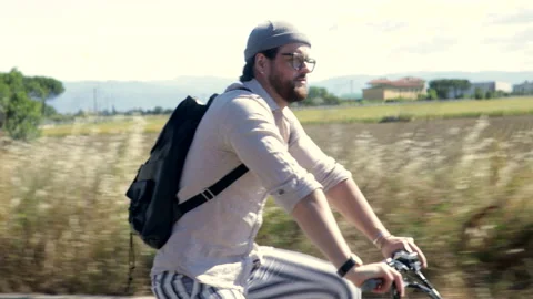 Attractive Man rides his foldable electric bike on the street, goes to work Video stock 131316602