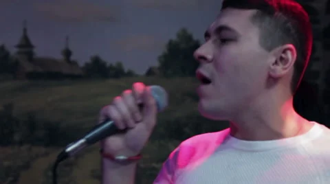 Attractive man sings close-up Stock Footage 59746690