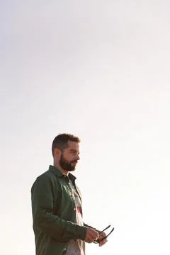 Attractive man with sky in background Stock Photos