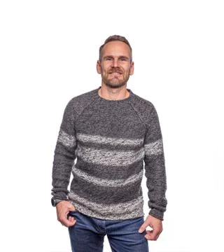 Attractive man standing posing over white background Stock Photos