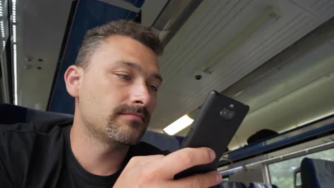 Attractive man on train Stock Footage 158167535