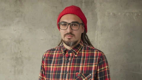 Attractive man using his smartwatch and controlling his smart home, hipster Stock Footage 145305126