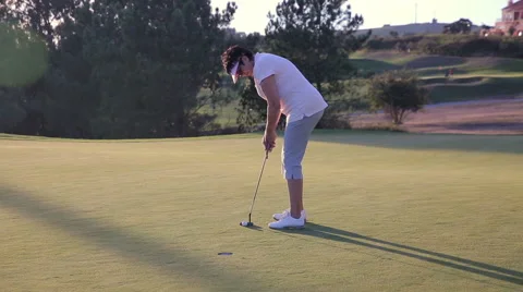 Attractive Mature woman plays Golf at the country club. Unsuccessful shot Stock Footage