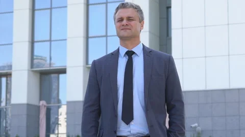 Attractive middle-aged man with gray hair. male close-up portrait. serious Stock Footage 90963577