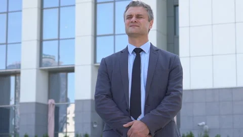 Attractive middle-aged man with gray hair. male close-up portrait. serious Stock Footage 90963660