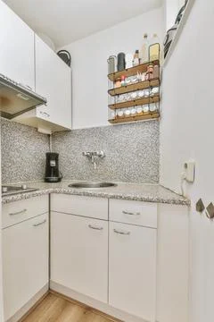 Attractive mini kitchen area Stock Photos