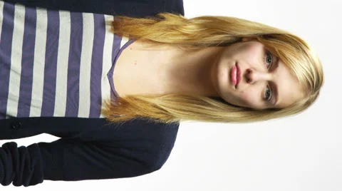 Attractive model stares into the camera Video stock 33877136