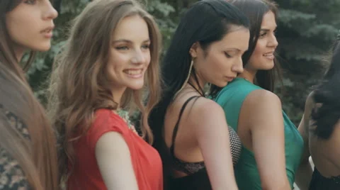 Attractive models wearing dresses posing on street Stock Footage 54111846