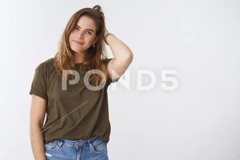 Attractive modern millennial good-looking charismatic european woman scratching Stock Photos