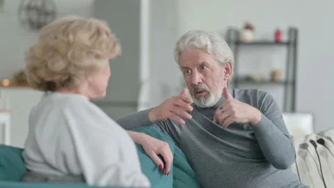 Attractive Old Man Talking to Old Woman a Home Stock Footage 148202306
