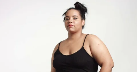 Attractive positive big model in one piece suit Stock Footage 81348208