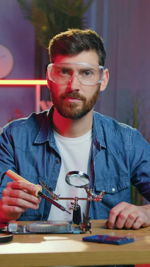 Attractive positive experienced 35-aged bearder in protective glasses posing on  Stock Footage 330664740