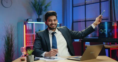 Attractive positive successful experienced bearded businessman sitting in front Stock Footage 166671061