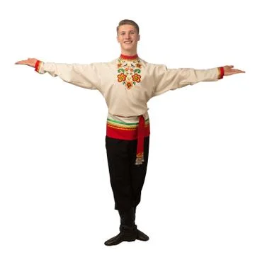 Attractive russian guy dancing in folk costume isolated on white Stock Photos