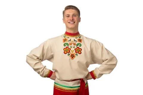 Attractive russian guy dancing in folk costume isolated on white Stock Photos