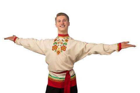 Attractive russian guy dancing in folk costume isolated on white Stock Photos