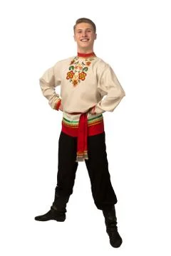 Attractive russian guy dancing in folk costume isolated on white Stock Photos