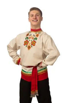 Attractive russian guy dancing in folk costume isolated on white Stock Photos