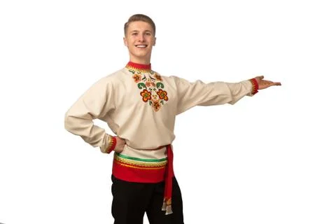 Attractive russian guy dancing in folk costume isolated on white Stock Photos