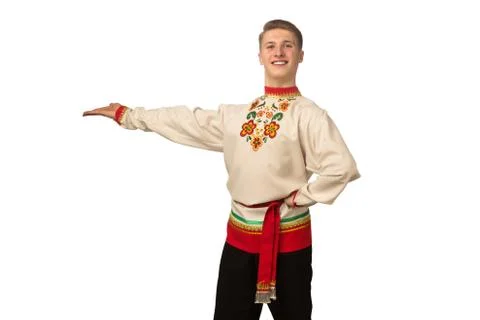 Attractive russian guy dancing in folk costume isolated on white Stock Photos
