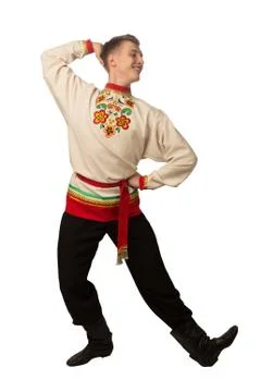 Attractive russian guy dancing in folk costume isolated on white Stock Photos