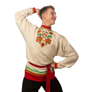 Attractive russian guy dancing in folk costume isolated on white Stock Photos