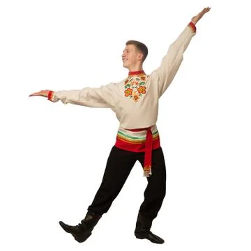 Attractive russian guy dancing in folk costume isolated on white Stock Photos