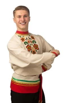 Attractive russian guy dancing in folk costume isolated on white Stock Photos