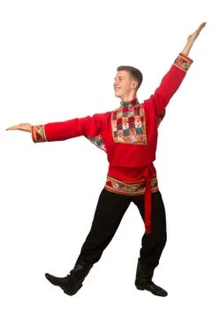 Attractive russian guy dancing in folk costume isolated on white Foto stock