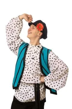 Attractive russian guy dancing in folk costume isolated on white Stock Photos