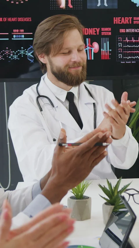 Attractive satisfied experienced confident mixed race medical colleagues greetin Stock Footage 332122501