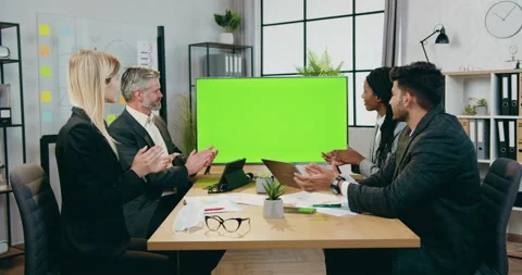 Attractive satisfied successful high-skilled mixed race businesspeople clapping Stock Footage 160985511