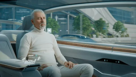 Attractive Senior Man Using Futuristic AR Interface for Reading News Stock Footage 132337387