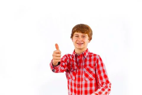 Attractive smiling boy in studio Stock Photos