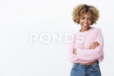 Attractive sociable and charismatic african-american female 20s with curly blond Stock Photos