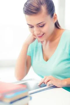 Attractive student girl using tablet pc 스톡 사진
