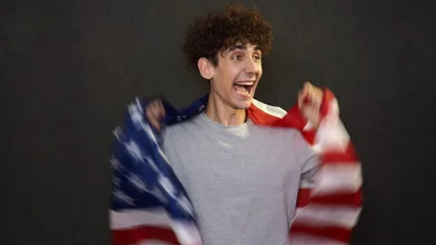 Attractive student holding  flag. Stock Footage 309510047