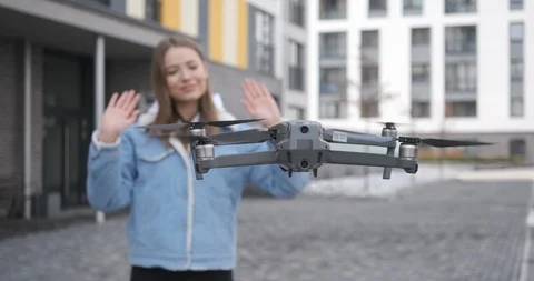 Attractive student taking selfie using copter Stock Footage 105770953