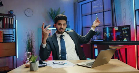 Attractive successful experienced smart bearded businessman in suit explaining Stock Footage 166615398