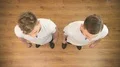 The attractive twin brothers smile to the camera. View from above 4k or 4k+ Resolution